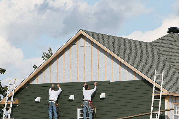 Professional Siding Installation technician working in Manhasset, NY